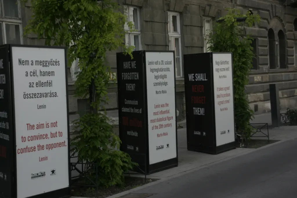 Panels featuring quotes and commentary by and about Lenin in front of the Terror Háza (House of Terror) in Budapest.